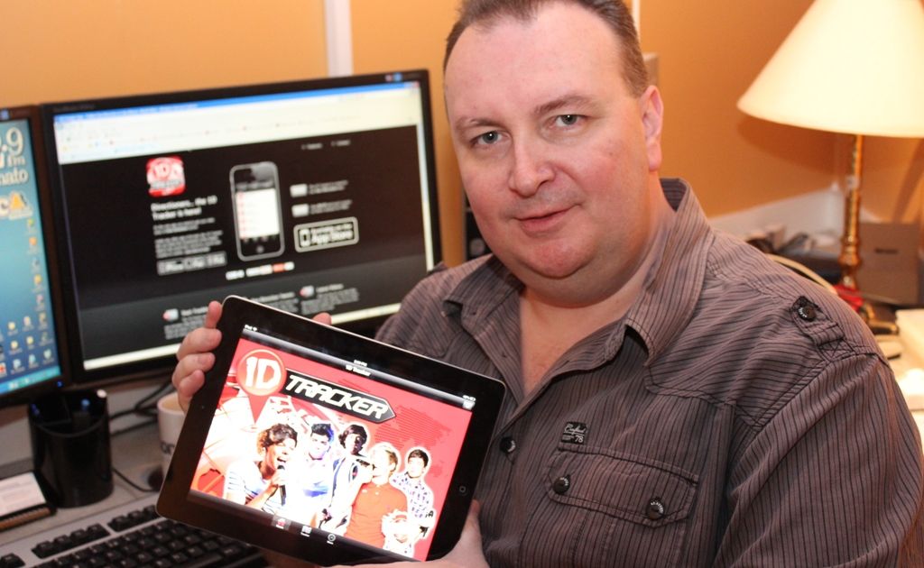 Adam Boulter revealing his '1D Tracker' app. Adam Boulter revealing his '1D Tracker' app.