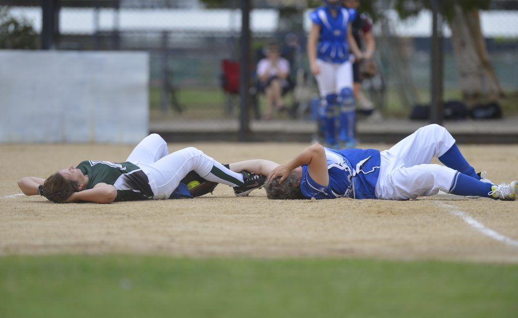 Psyclone's Amanda Noonan collides with a Souths player. Psyclone's Amanda Noonan collides with a Souths player.