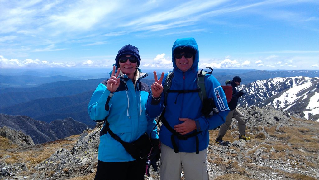 Nigel and Leanne Phillips celebrate reaching the second of their peaks, the 2195 metre high Mount Twynam. Nigel and Leanne Phillips celebrate reaching the second of their peaks, the 2195 metre high Mount Twynam.