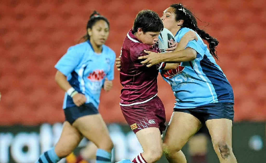 Heather Ballinger shows her style for the Maroons at Suncorp Stadium. Heather Ballinger shows her style for the Maroons at Suncorp Stadium.