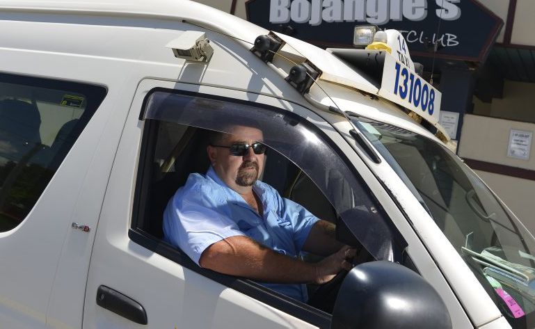 Blue and White taxi driver, Jim Redman. Blue and White taxi driver, Jim Redman.