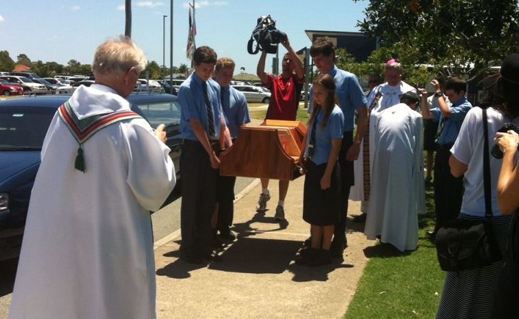 A holy relic of St Francis Xavier, his hand and forearm, will arrive in Ballina tonight. Here it is pictured being escorted by school students during a stop at Hervey Bay. A holy relic of St Francis Xavier, his hand and forearm, will arrive in Ballina tonight. Here it is pictured being escorted by school students during a stop at Hervey Bay.