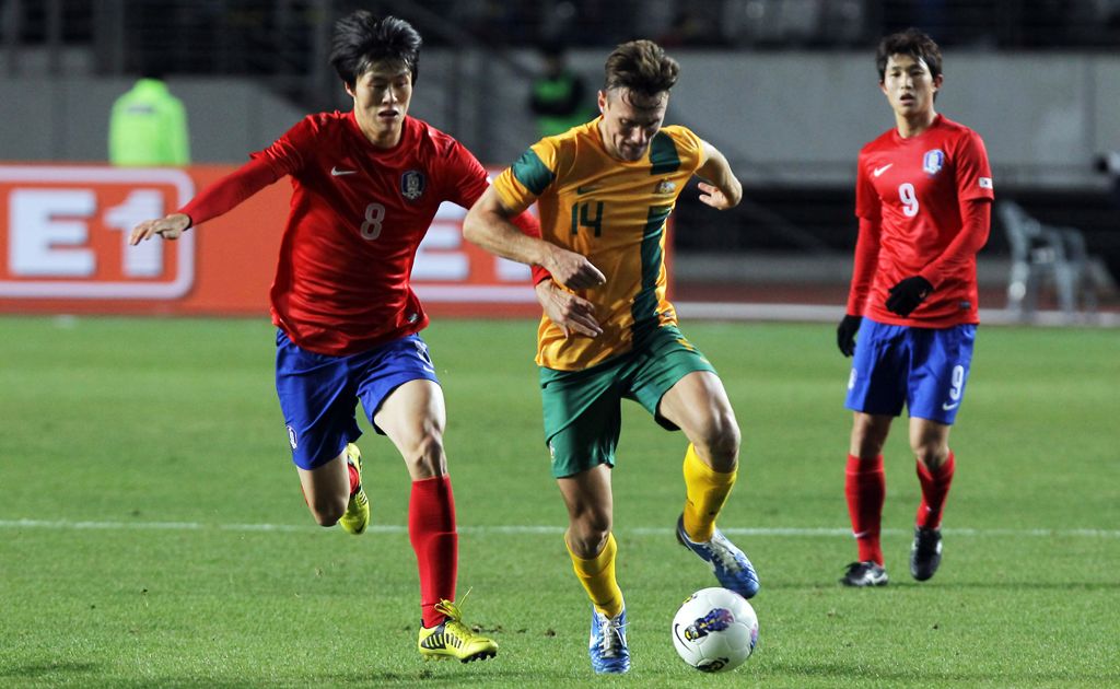 James Holland of Australia tussles for posession with Koh Myung-Jin of South Korea during the friendly match between Australia and South Korea on November 14, 2012 in Gyeonggi-do, South Korea. James Holland of Australia tussles for posession with Koh Myung-Jin of South Korea during the friendly match between Australia and South Korea on November 14, 2012 in Gyeonggi-do, South Korea.