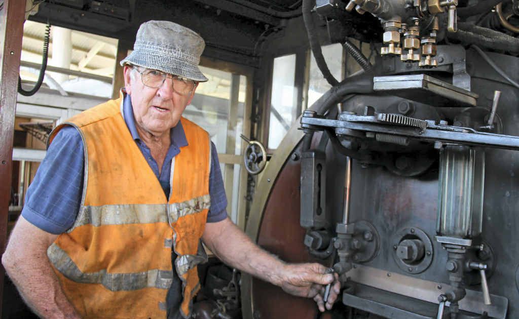 Fitter John Brady checking the water levels in the steam train ahead of tomorrow’s trip to Wallangarra. Fitter John Brady checking the water levels in the steam train ahead of tomorrow’s trip to Wallangarra.