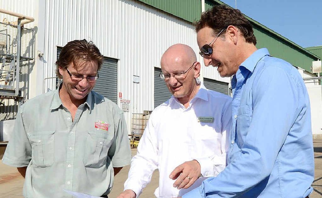 ON SITE: General manager for Greenmountain Food Processing Pty Ltd Jason Giddins (l) and director John Scarrabelotti (r) with member for Blair Shayne Neumann at the Greenmountain Food Processing plant. ON SITE: General manager for Greenmountain Food Processing Pty Ltd Jason Giddins (l) and director John Scarrabelotti (r) with member for Blair Shayne Neumann at the Greenmountain Food Processing plant.