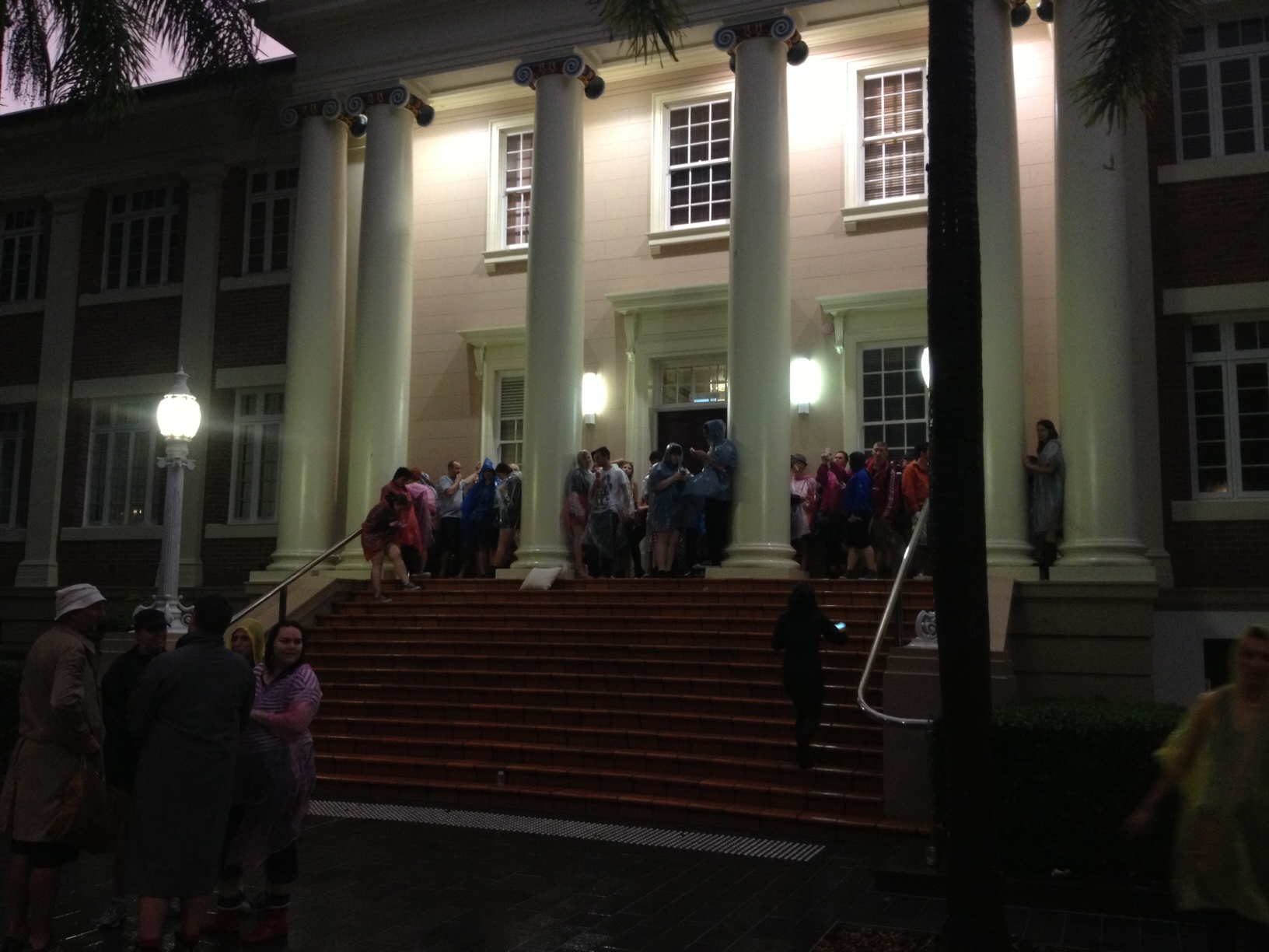 Revellers take shelter in QUT after the music festival was evacuated. Revellers take shelter in QUT after the music festival was evacuated.