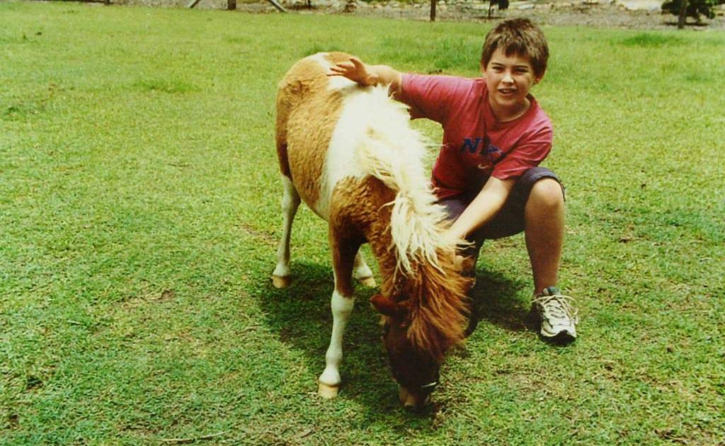 Daniel Morcombe with a pony. Daniel Morcombe with a pony.
