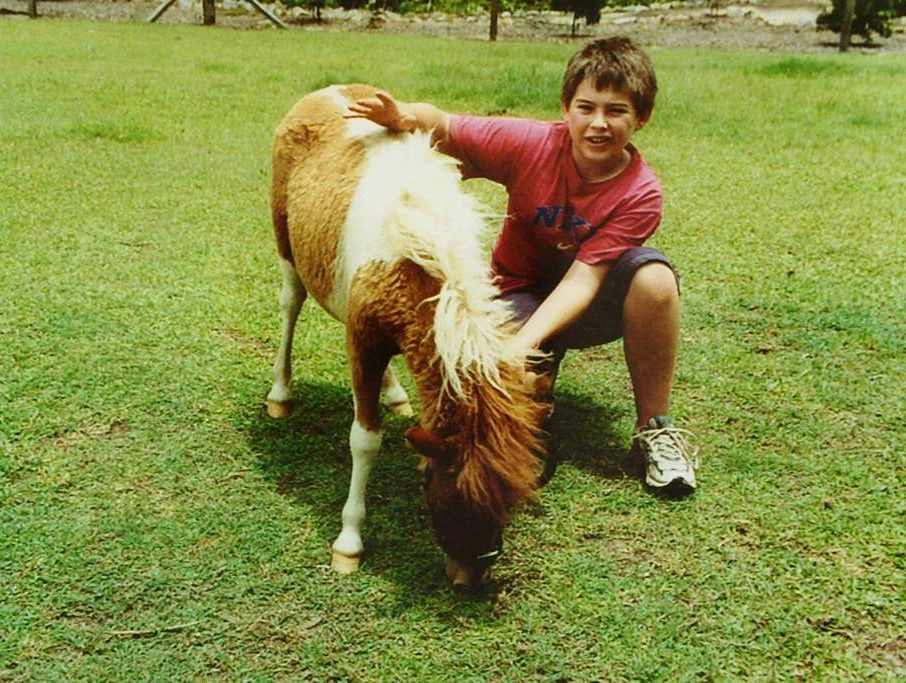 Daniel Morcombe with a pony. Daniel Morcombe with a pony.