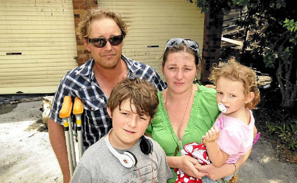 Despite their home being destroyed by fire, Tom Smith, Elicia Maxwell, Isabella Smith, 3, and Connor Smith, 11, feel lucky the family escaped unhurt. Despite their home being destroyed by fire, Tom Smith, Elicia Maxwell, Isabella Smith, 3, and Connor Smith, 11, feel lucky the family escaped unhurt.