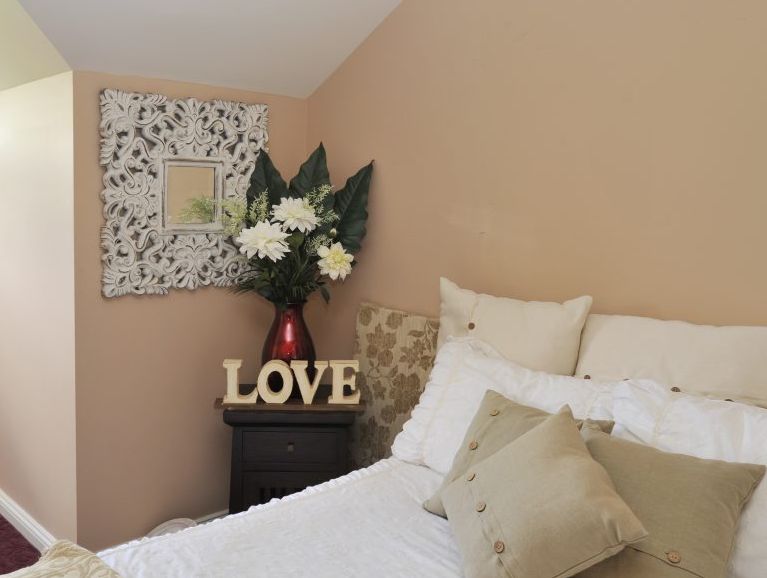 The upstairs guest bedroom. The upstairs guest bedroom.