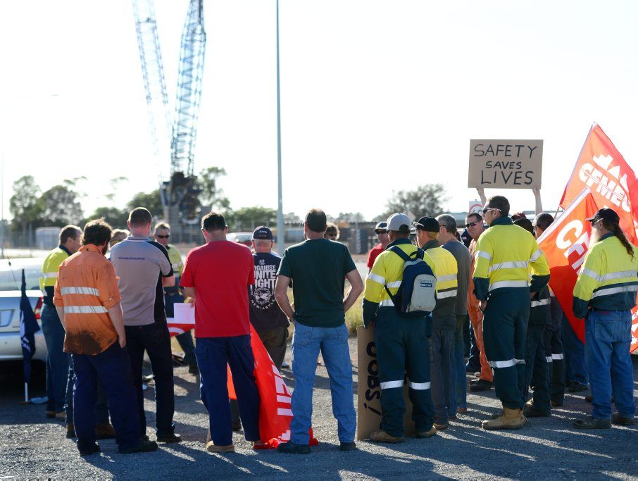 Union members protest on Port Central Way, Gladstone. Union members protest on Port Central Way, Gladstone.
