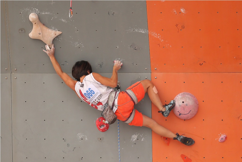 Liu Hiu Ying of Hong Kong completes in the Sport Climbing Women's Lead Final on Day 4 of the 3rd Asian Beach Games Haiyang 2012 on June 20, 2012 in Haiyang, China. Liu Hiu Ying of Hong Kong completes in the Sport Climbing Women's Lead Final on Day 4 of the 3rd Asian Beach Games Haiyang 2012 on June 20, 2012 in Haiyang, China.