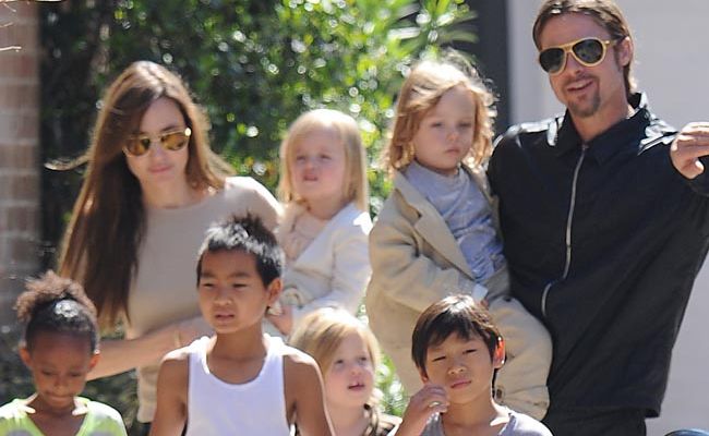 Angelina Jolie with Brad Pitt and their kids. Angelina Jolie with Brad Pitt and their kids.