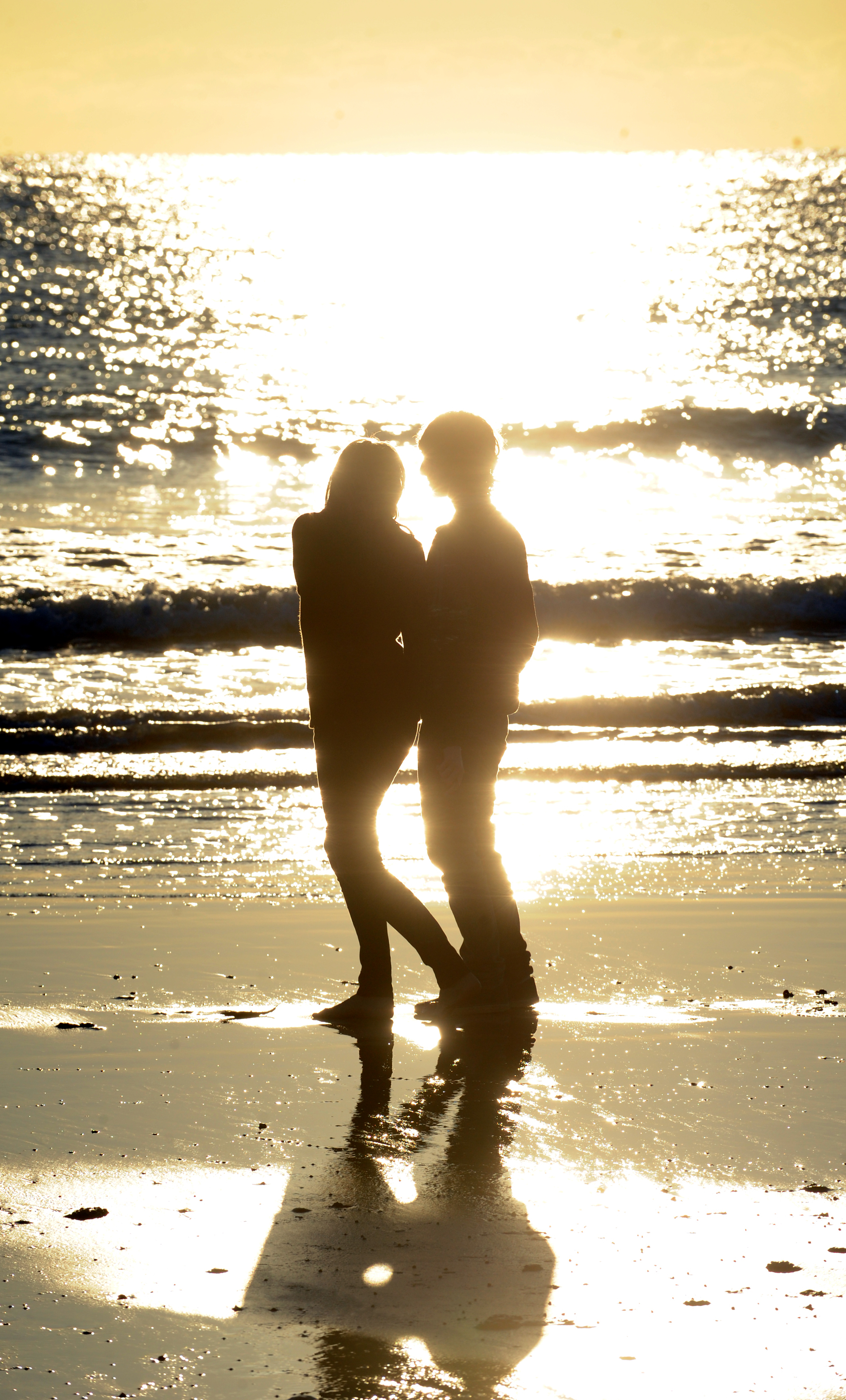 A couple on the beach. A couple on the beach.