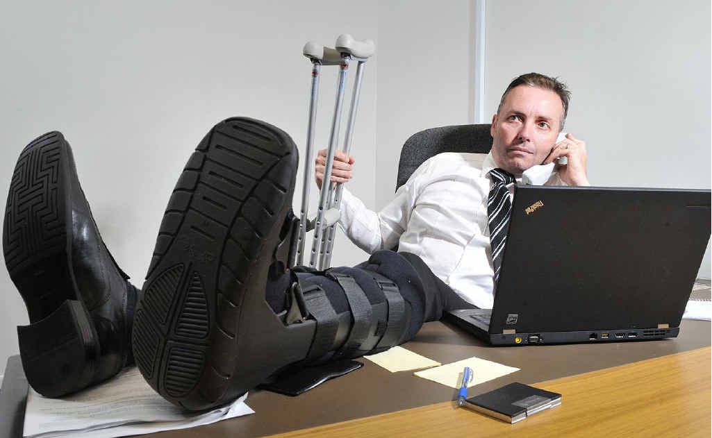 BATTLING ON: Member for Ipswich West Sean Choat is still kicking along despite his leg injury sustained in the Ulysses Toy Run on the weekend. BATTLING ON: Member for Ipswich West Sean Choat is still kicking along despite his leg injury sustained in the Ulysses Toy Run on the weekend.