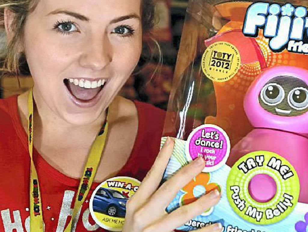 Megan Atwood with a new toy from Toyworld, Fijit Friends. Megan Atwood with a new toy from Toyworld, Fijit Friends.