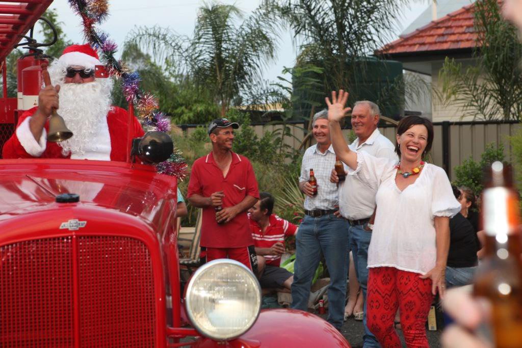 Enjoying the party last Saturday in Wallumbilla are Santa, Graham York, Colin Maunder and Cabin Park host Anne Albeck