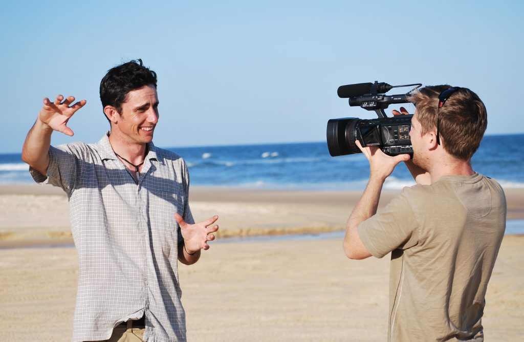 Ecologist Brad Purcell with researcher-cameraman Matt Hamilton shooting a documentary about dingoes on Fraser Island. 