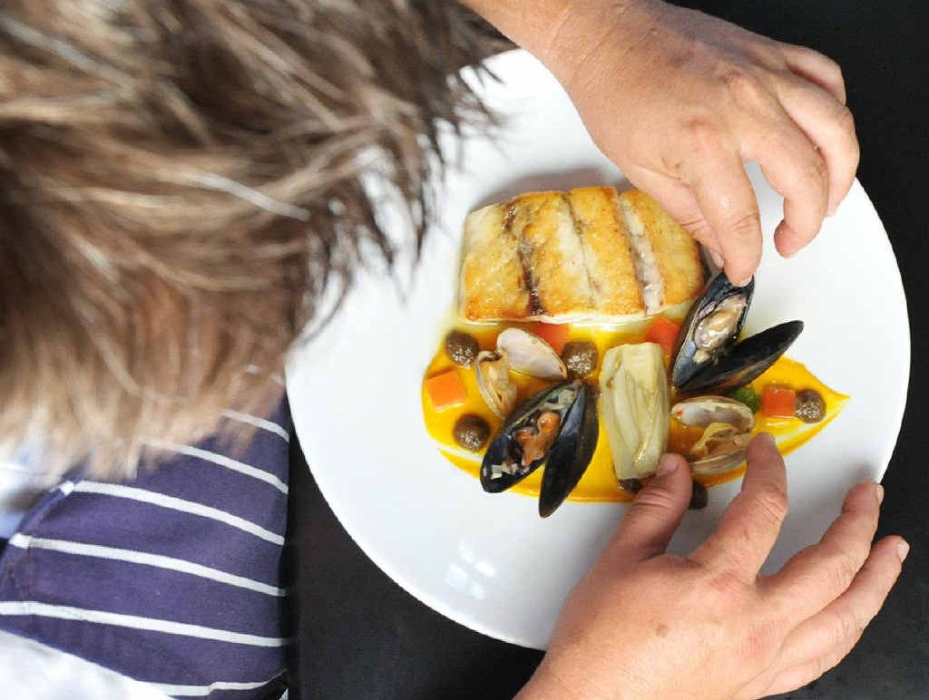 TANTALISING: Head chef at Stumps Hotel Jamie Pearce plates up a taste sensation. TANTALISING: Head chef at Stumps Hotel Jamie Pearce plates up a taste sensation.