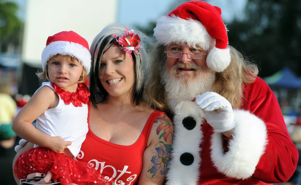 Lacey and Cyndi Malcolm with Santa at the Carols by Candlelight. Lacey and Cyndi Malcolm with Santa at the Carols by Candlelight.