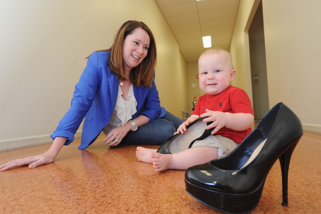 Marketing manager Erin Sorrensen wore heels up until she was eight months pregnant with her first child, Henry, when she started to feel her balance was affected by wearing the sky-high shoes. Marketing manager Erin Sorrensen wore heels up until she was eight months pregnant with her first child, Henry, when she started to feel her balance was affected by wearing the sky-high shoes.