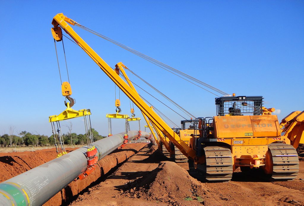 Burial of the 420-kilometre Santos GLNG underground gas transmission pipeline has commenced. Burial of the 420-kilometre Santos GLNG underground gas transmission pipeline has commenced.