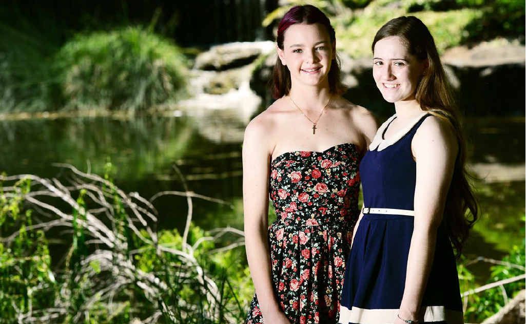 GLAD IT’S FINISHED: Stacey Thomas and Mika Varitimos are among four IGGS students to receive OP1s. Stacey will study music and Mika hopes to move into medicine. GLAD IT’S FINISHED: Stacey Thomas and Mika Varitimos are among four IGGS students to receive OP1s. Stacey will study music and Mika hopes to move into medicine.