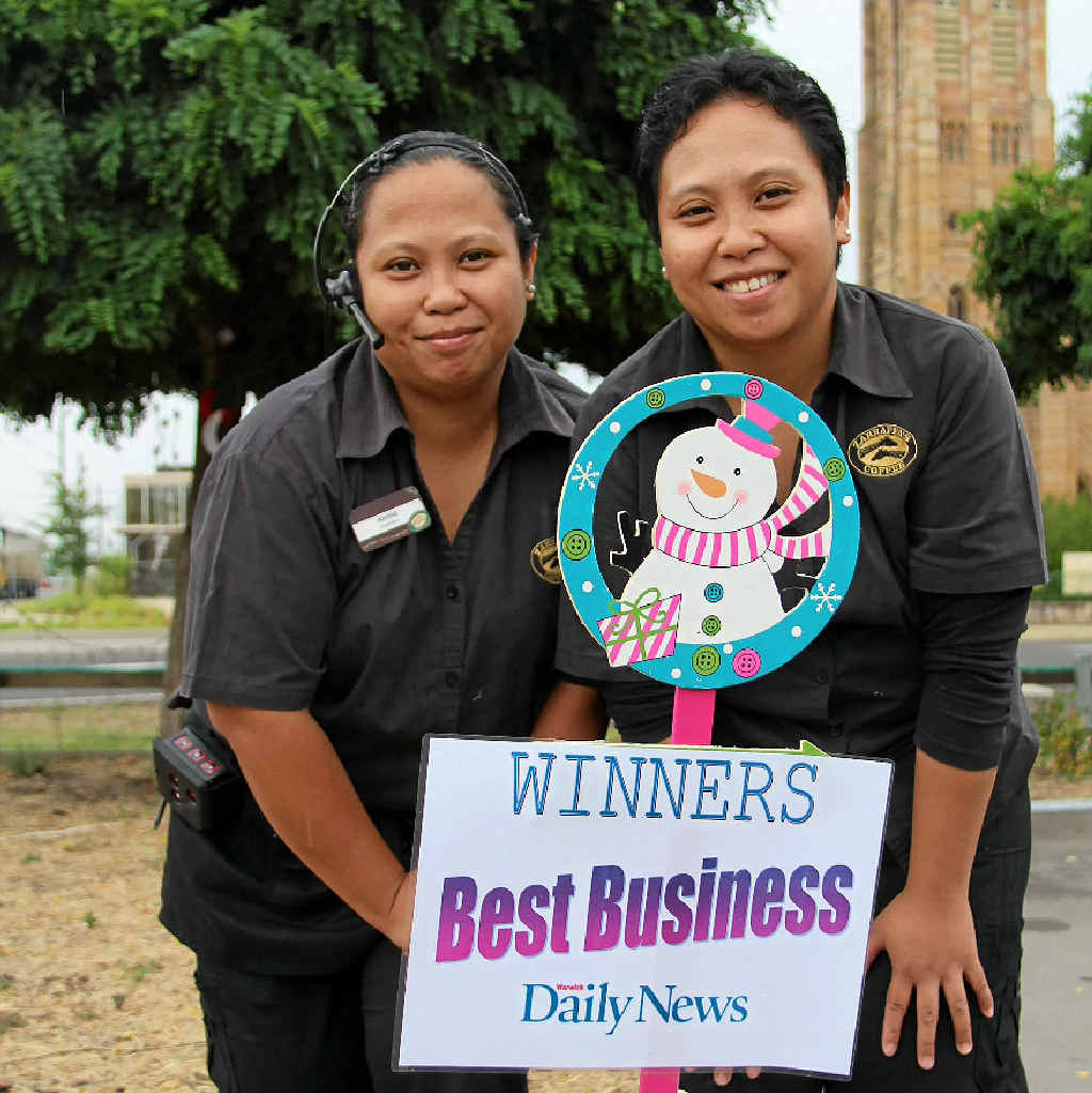 Twins Annie and Belle Ompoc help set up Zarraffa's winning light display on a daily basis.