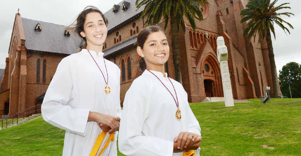 FAITHFUL: Carly Taylor, 13, and her sister Lucy Taylor, 11, of Lismore will be among the altar servers over Christmas at the many catholic churches in the area. FAITHFUL: Carly Taylor, 13, and her sister Lucy Taylor, 11, of Lismore will be among the altar servers over Christmas at the many catholic churches in the area.