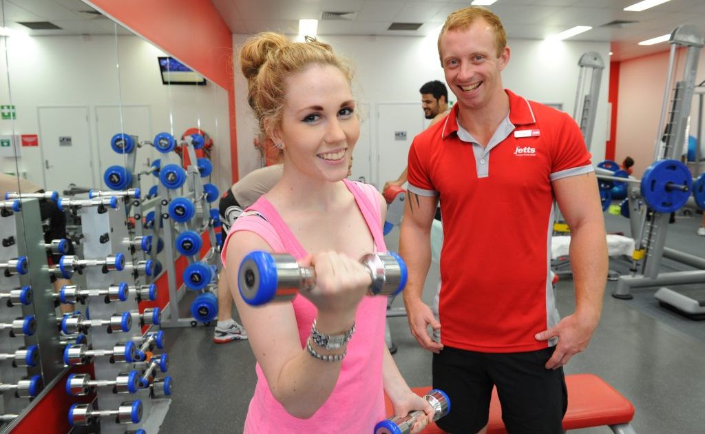 Keegan Lankowski assists Sage Betts with her workout routine at the Jetts Gym in the Westside Shopping Centre. Keegan Lankowski assists Sage Betts with her workout routine at the Jetts Gym in the Westside Shopping Centre.