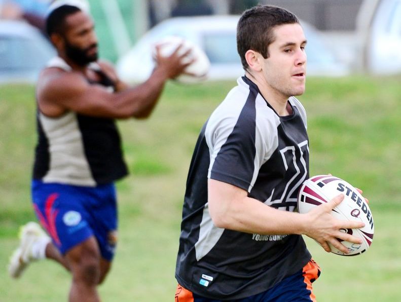 Ipswich Jets players on their first night back for pre-season training. Dane Phillips runs with the ball. Ipswich Jets players on their first night back for pre-season training. Dane Phillips runs with the ball.