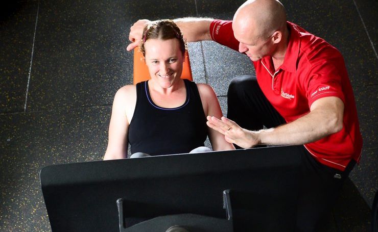 Personal Trainer Paul Florence encourages his client Emma Lennon during a workout at the Raceview Lifestyle Health Club. Personal Trainer Paul Florence encourages his client Emma Lennon during a workout at the Raceview Lifestyle Health Club.