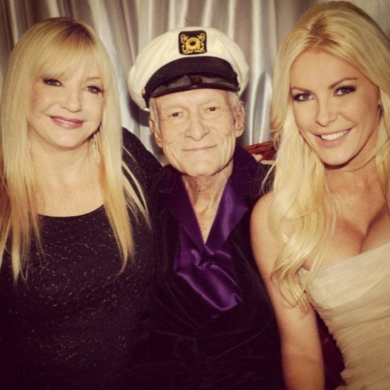 Hugh Hefner and Crystal Harris on their wedding day with Crystal's mum. Hugh Hefner and Crystal Harris on their wedding day with Crystal's mum.