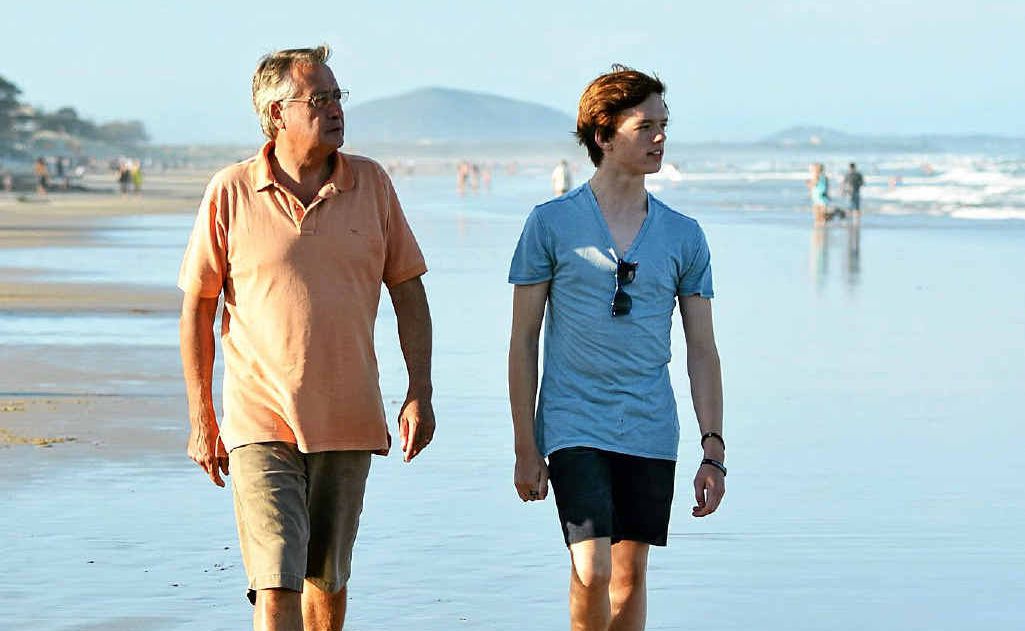 Federal Treasurer Wayne Swan and his son Matt enjoy a walk on the beach while holidaying on the Sunshine Coast. Federal Treasurer Wayne Swan and his son Matt enjoy a walk on the beach while holidaying on the Sunshine Coast.