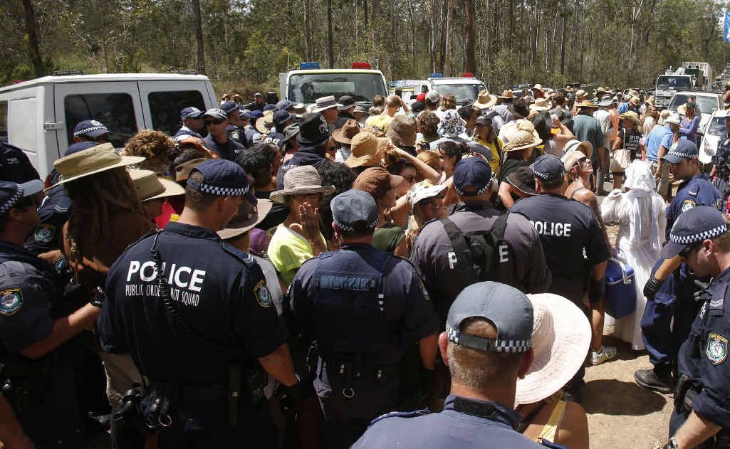 Police move protesters back along The Avenue as they close the road around the Glenugie CSG site. Photos: Adam Hourigan Police move protesters back along The Avenue as they close the road around the Glenugie CSG site. Photos: Adam Hourigan