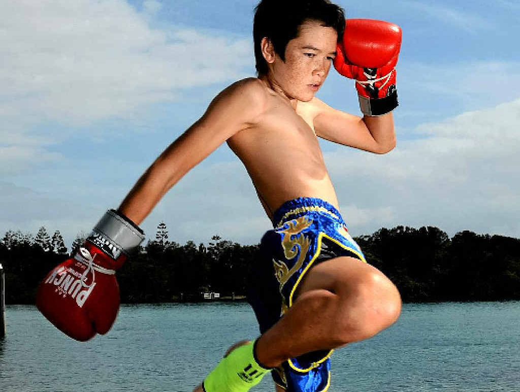 RAW TALENT: 13-year-old Muay Thai fighter John Robinson in training at Tweed Heads. RAW TALENT: 13-year-old Muay Thai fighter John Robinson in training at Tweed Heads.