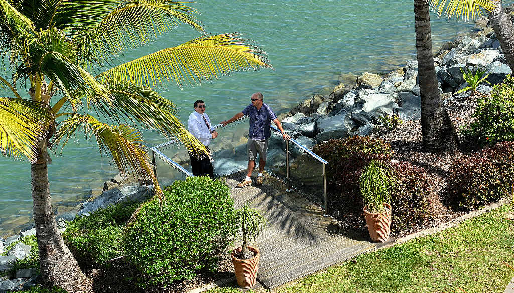 Clarion Hotel manager Shane Bowman (left) and Ben Anderson take time out at Mackay Marina, a popular tourist destination. Clarion Hotel manager Shane Bowman (left) and Ben Anderson take time out at Mackay Marina, a popular tourist destination.