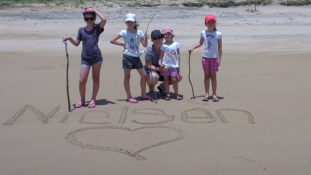 Renee and Amy Nielsen, Liz Carson, Brooke and Kayla Nielsen write their name in the sand on the LARC tour. Photo Liz Carson / NewsMail Renee and Amy Nielsen, Liz Carson, Brooke and Kayla Nielsen write their name in the sand on the LARC tour. Photo Liz Carson / NewsMail