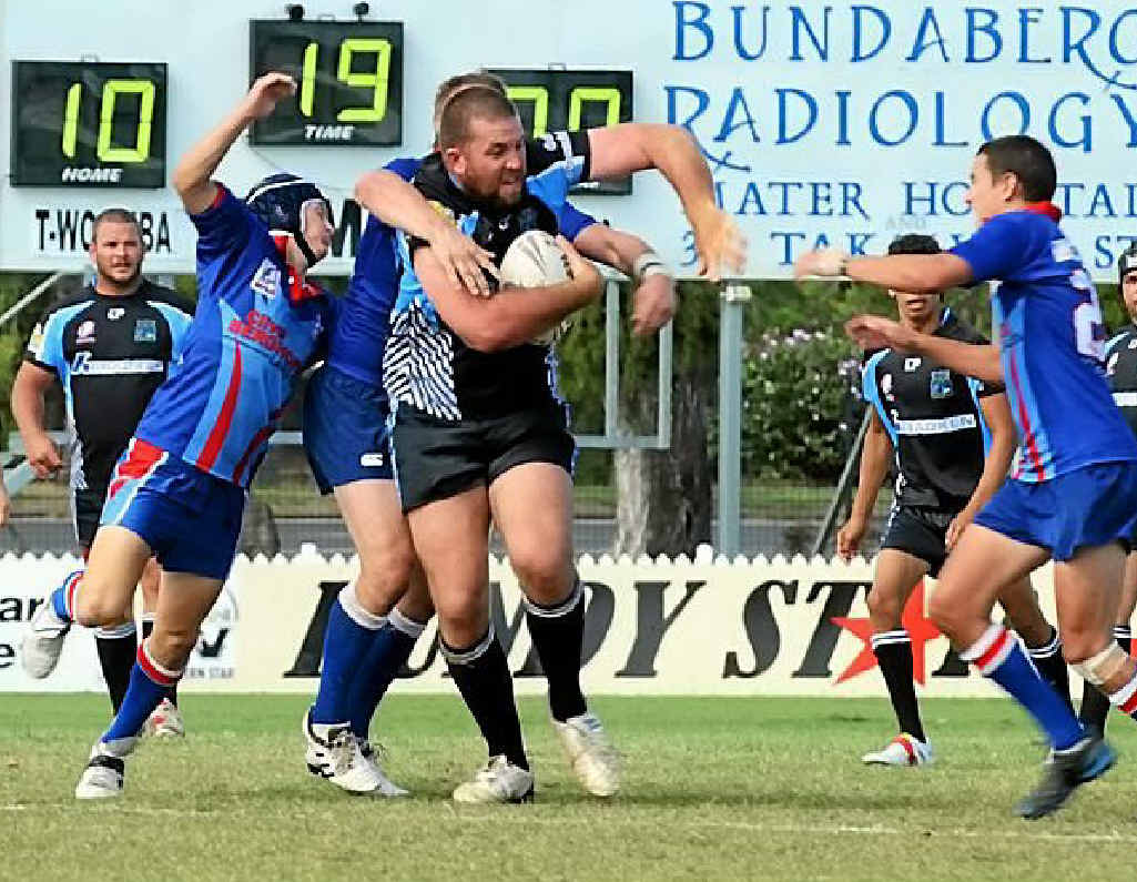 LOCAL LEAGUE: Central Highlands player Brendan Finger pushes through the Toowoomba defence in the 47th Battalion Cup at Salter Oval in 2010. LOCAL LEAGUE: Central Highlands player Brendan Finger pushes through the Toowoomba defence in the 47th Battalion Cup at Salter Oval in 2010.