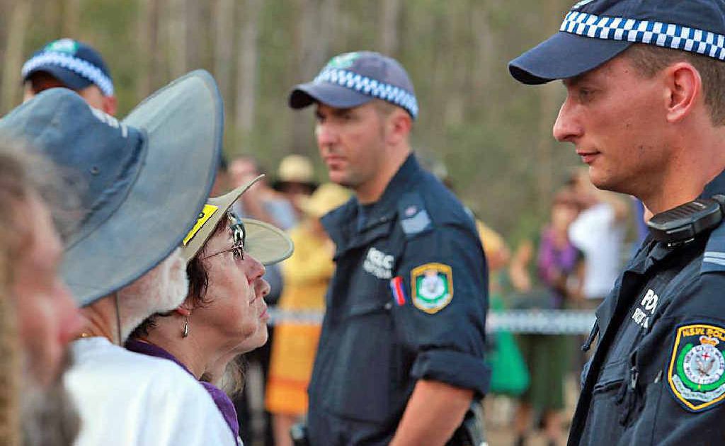 FACE OFF: Police confront protestors at Glenugie, most of whom were local residents. The average age of the six people kept in custody overnight was 55. PHOTO: Jimmy Malecki FACE OFF: Police confront protestors at Glenugie, most of whom were local residents. The average age of the six people kept in custody overnight was 55. PHOTO: Jimmy Malecki