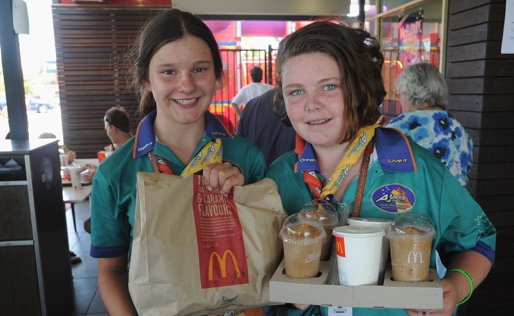 Scouts Elsa McConvill and Kristen Watkins pick up some McDonald's during the 2013 Scout Jamboree. Scouts Elsa McConvill and Kristen Watkins pick up some McDonald's during the 2013 Scout Jamboree.
