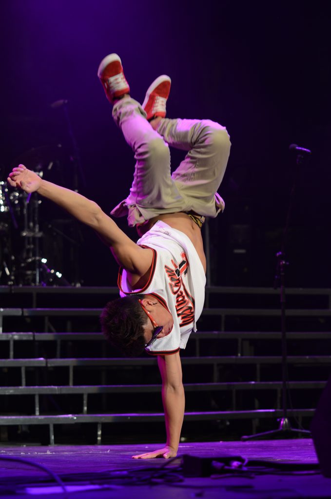 A member of Justice Crew on stage at the scout jamboree.