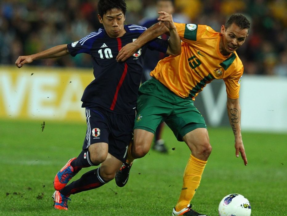Shinji Kagawa of Japan is challenged by Jade North of Australia during the FIFA World Cup Asian Qualifier match between the Australian Socceroos and Japan at Suncorp Stadium on June 12, 2012 in Brisbane, Australia. Shinji Kagawa of Japan is challenged by Jade North of Australia during the FIFA World Cup Asian Qualifier match between the Australian Socceroos and Japan at Suncorp Stadium on June 12, 2012 in Brisbane, Australia.