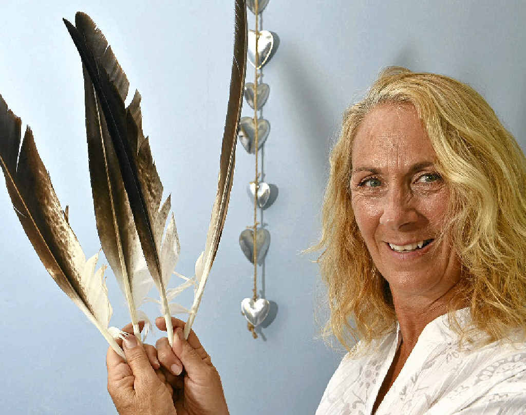Psychic Jannine Umana says feather spirit readings have won over the wary. Psychic Jannine Umana says feather spirit readings have won over the wary.
