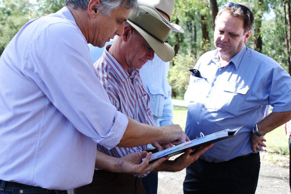 CHRC manager for corporate governance Bill Wilkinson takes Premier Campbell Newman through plans for flood mitigation works at the Nogoa River Rail Bridge. Photo Rebekah Polley / CQ News CHRC manager for corporate governance Bill Wilkinson takes Premier Campbell Newman through plans for flood mitigation works at the Nogoa River Rail Bridge. Photo Rebekah Polley / CQ News
