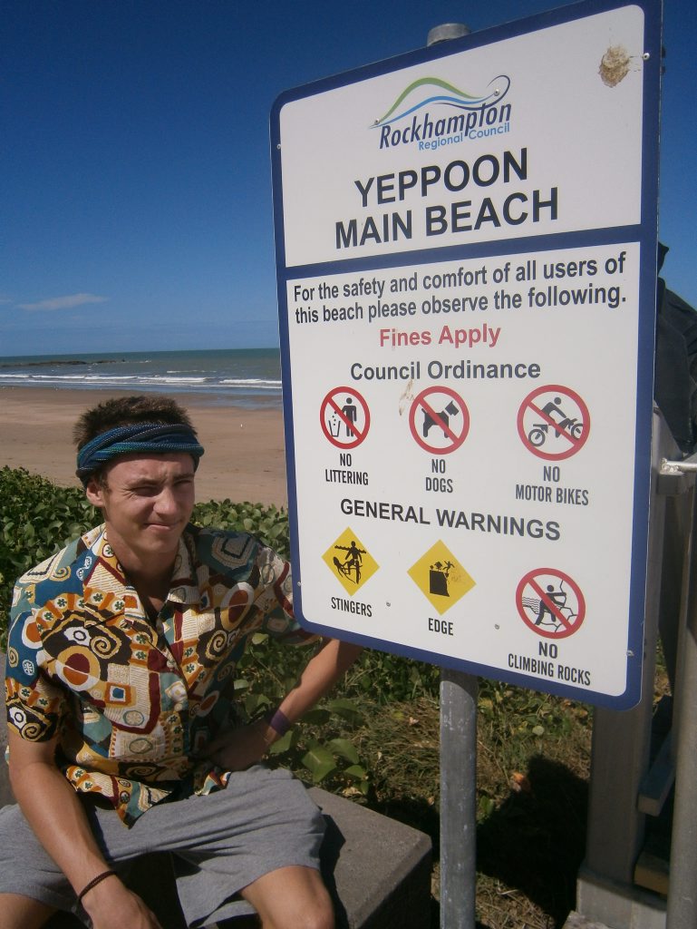 Duncan Mitchell takes heed of stinger warnings on Main Beach, Yeppoon. Duncan Mitchell takes heed of stinger warnings on Main Beach, Yeppoon.