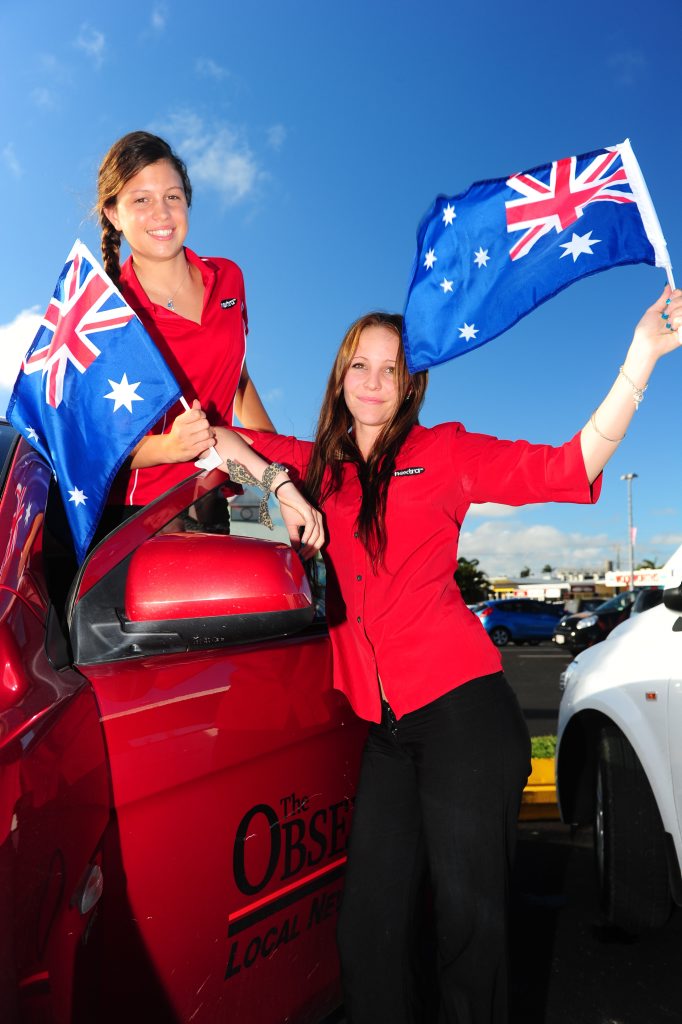 Staff members Lindsay Mathison and Dimity Rauter, from the Valley Newsagency in Gladstone, show off the Australian flags that are available for purchase with The Observer's print edition. Staff members Lindsay Mathison and Dimity Rauter, from the Valley Newsagency in Gladstone, show off the Australian flags that are available for purchase with The Observer's print edition.