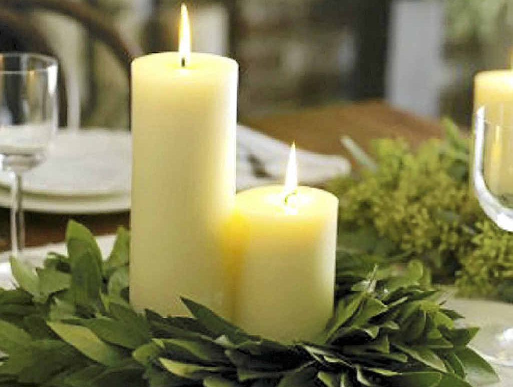 Candles and fresh greenery make a beautiful centrepiece. You can use almost any greenery from your garden as decoration for a table, especially when used with candles. Candles and fresh greenery make a beautiful centrepiece. You can use almost any greenery from your garden as decoration for a table, especially when used with candles.