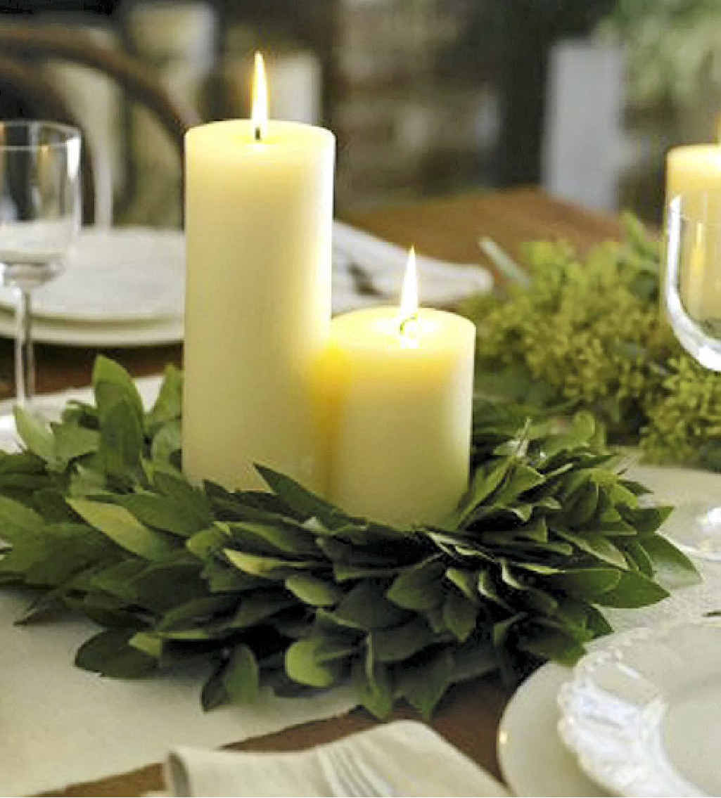Candles and fresh greenery make a beautiful centrepiece. You can use almost any greenery from your garden as decoration for a table, especially when used with candles. Candles and fresh greenery make a beautiful centrepiece. You can use almost any greenery from your garden as decoration for a table, especially when used with candles.