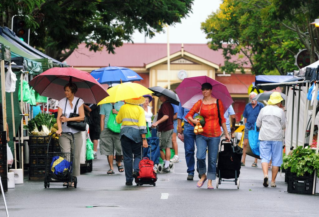 The first day of real rain has little effect Maryborough market goers, Umbrellas being the main accessory. Photo: Robyne Cuerel / Fraser Coast Chronicle